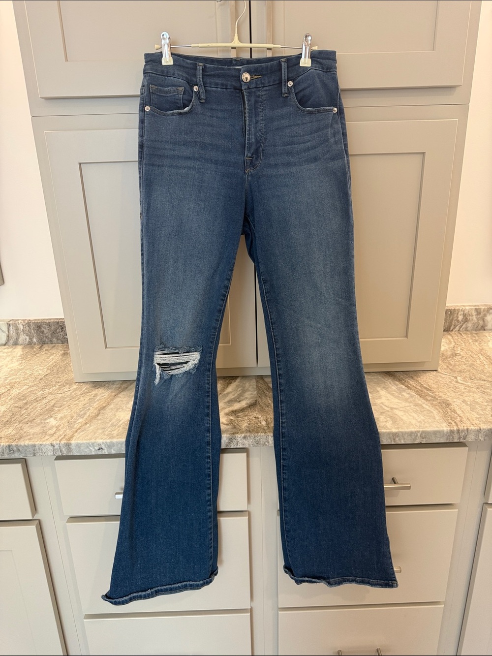 Good American Dark Blue Flare Jeans with Distressed Knee